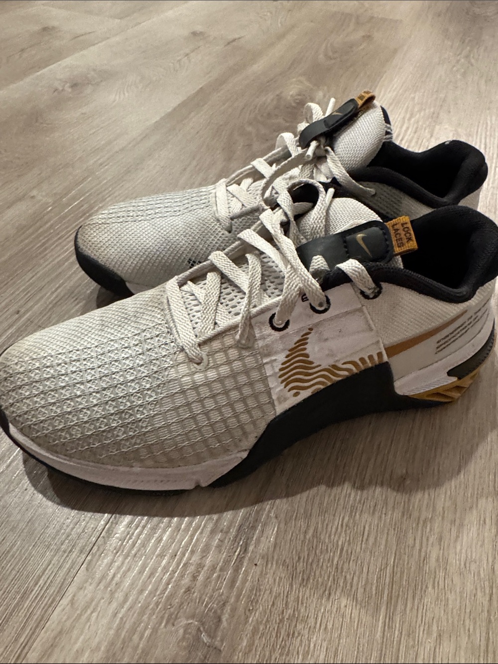 Nike Training Metcon Sneakers in White with Gold Accents